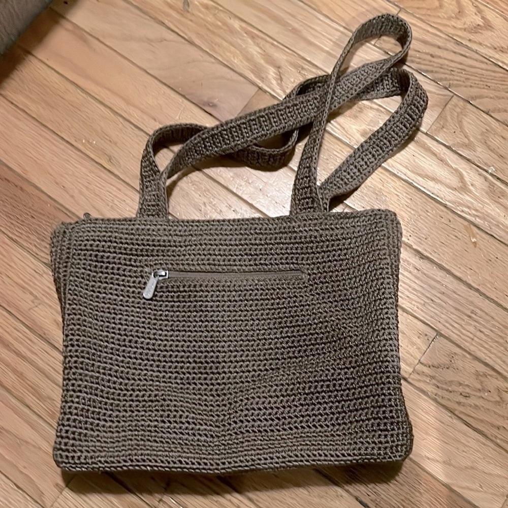 The Sak.Crocheted beige taupe shoulder bag.Double strap sleek roomy nice shape